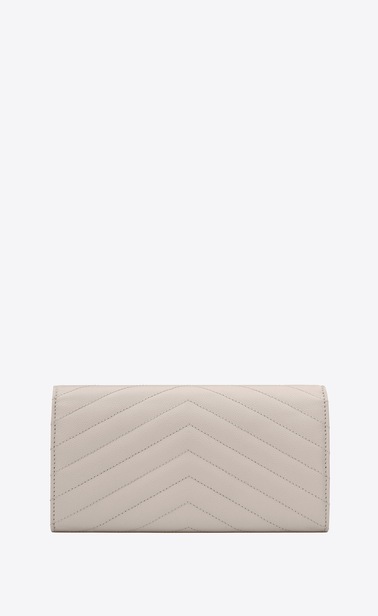 Monogram large flap wallet in grain de poudre embossed leather